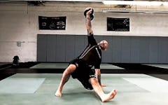 Joey Alvarado performing the Kettlebell Turkish Get Up Exercise.