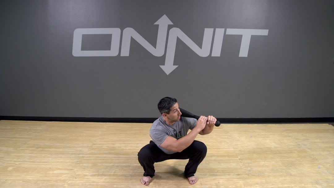 Steel Club Exercise: 2-Hand Side Shouldered Squat