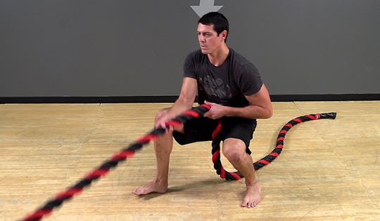 Battle Rope Exercise: Anchored Squat Stance Traveling Row