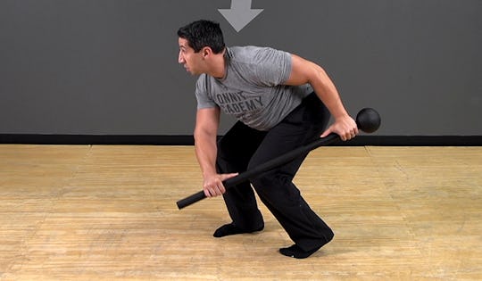 Steel Mace Exercise: Staggered Paddle Swing