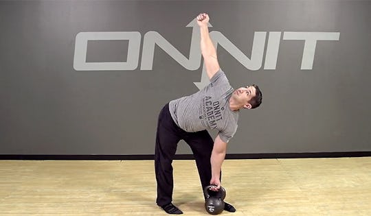 Windmill from ground kettlebell exercise