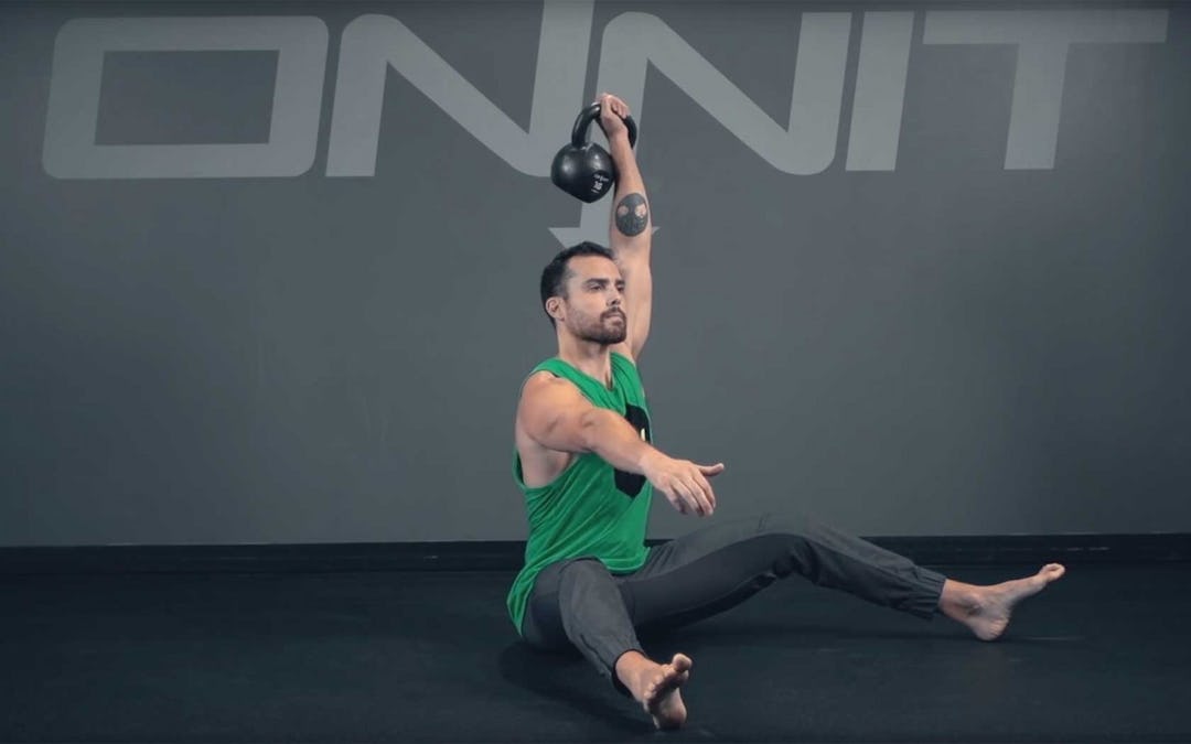 Seated One Arm Kettlebell Press Exercise
