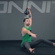Seated One Arm Kettlebell Press Exercise