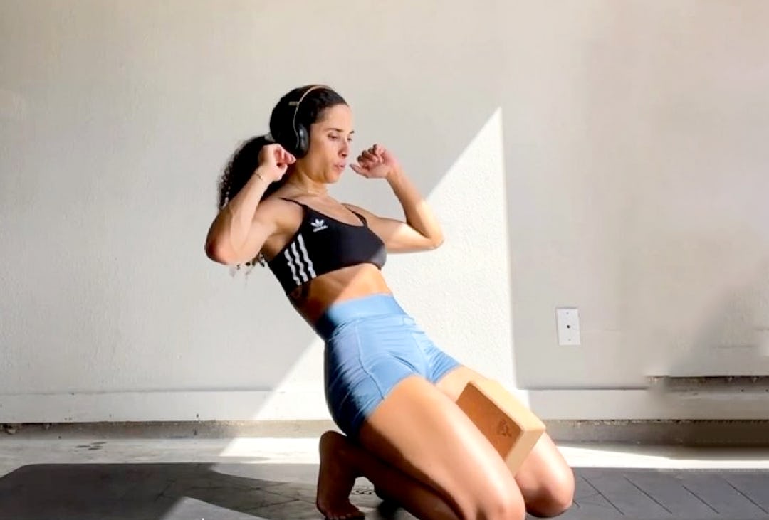 Woman performing dynamic core exercise