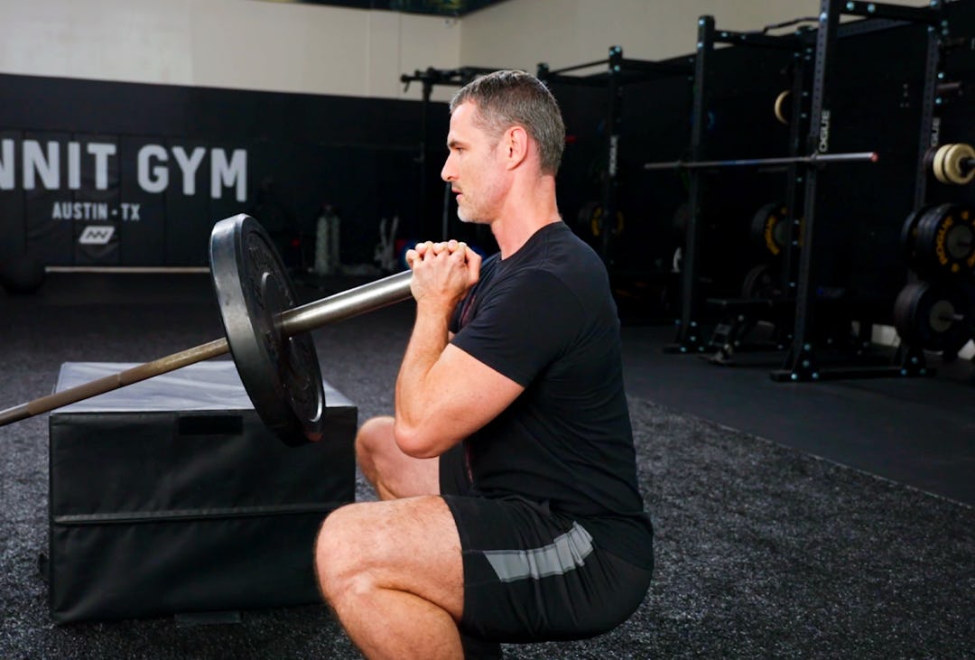 Onnit Editor-in-Chief Sean Hyson demonstrates the landmine squat exercise.