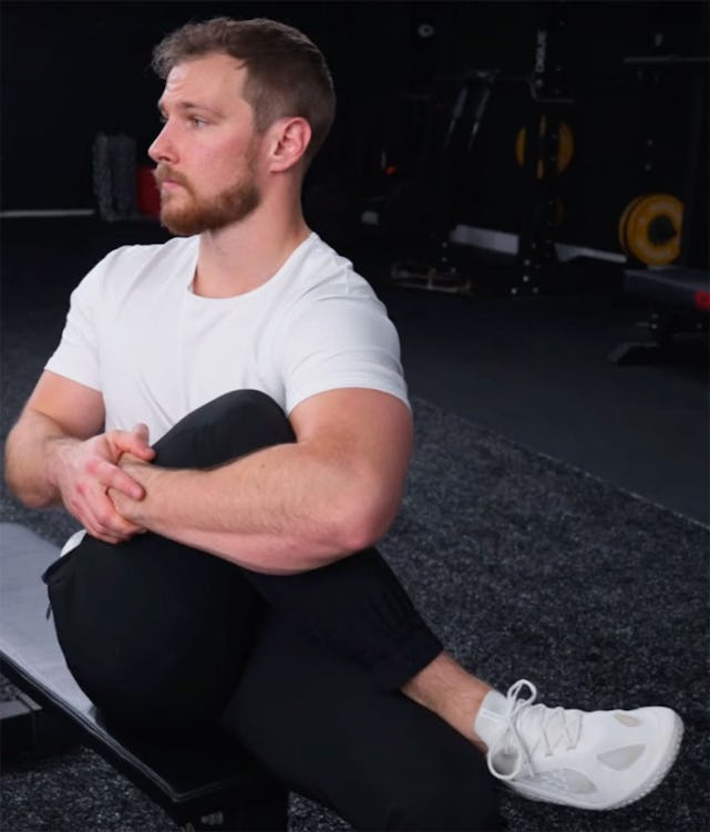 Chiropractor Layne Palm demonstrates the seated glute stretch.