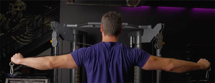 Onnit Editor-in-Chief Sean Hyson, CSCS, demonstrates the rear-delt cable fly.