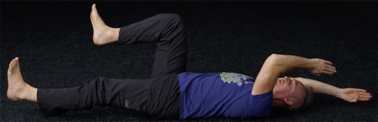 Shane Heins demonstrates the dead bug with reach.